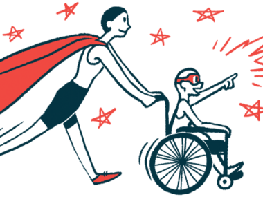 A woman in cape pushes a child in wheelchair.