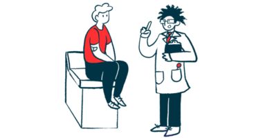 A doctor gestures with one hand and holds a clipboard with the other while speaking with a patient seated on an examining table.