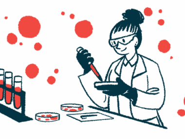 A scientist works in a laboratory with a dropper and a petri dish.