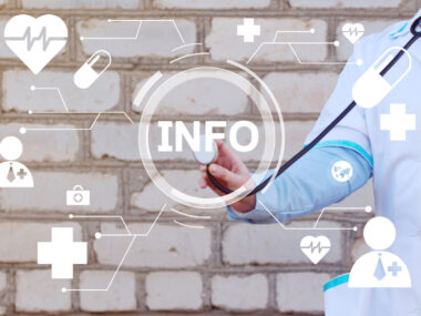 doctor with hand pointing to 