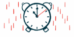 An analog alarm clock indicating 11 o'clock.
