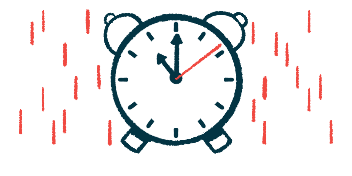An analog alarm clock indicating 11 o'clock.