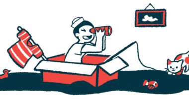 A child pretends to be a sailor, with a cardboard box as a boat and a shirt as a sail.